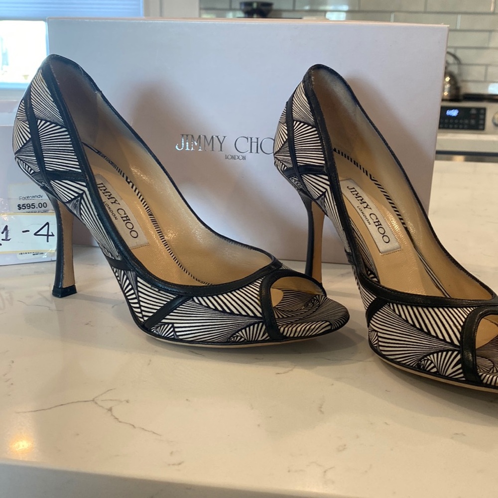 Jimmy Choo London size 38 silk peep pump black. Slightly used. Very well made